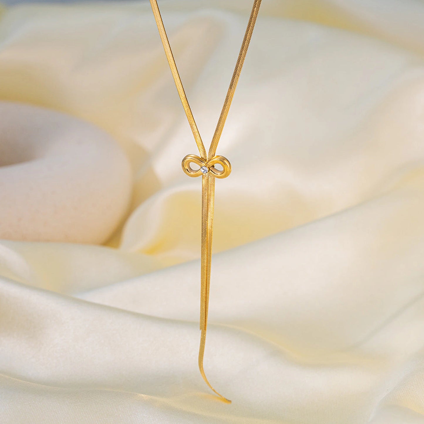 Stainless Steel Bow Design Necklace And Earrings Suite